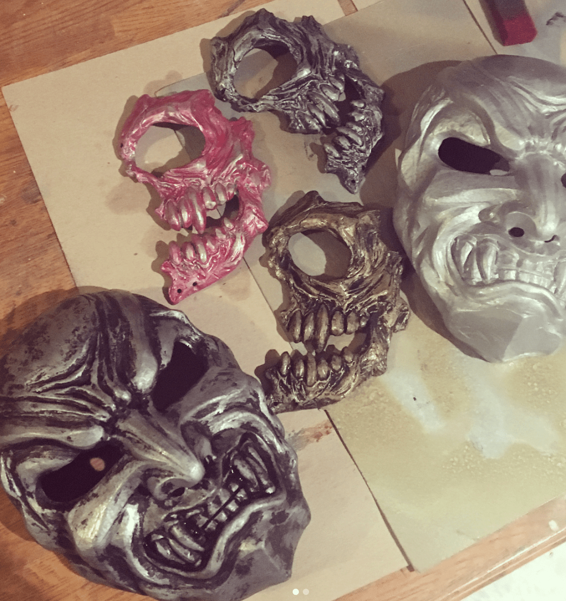 resin masks with first coat of paint