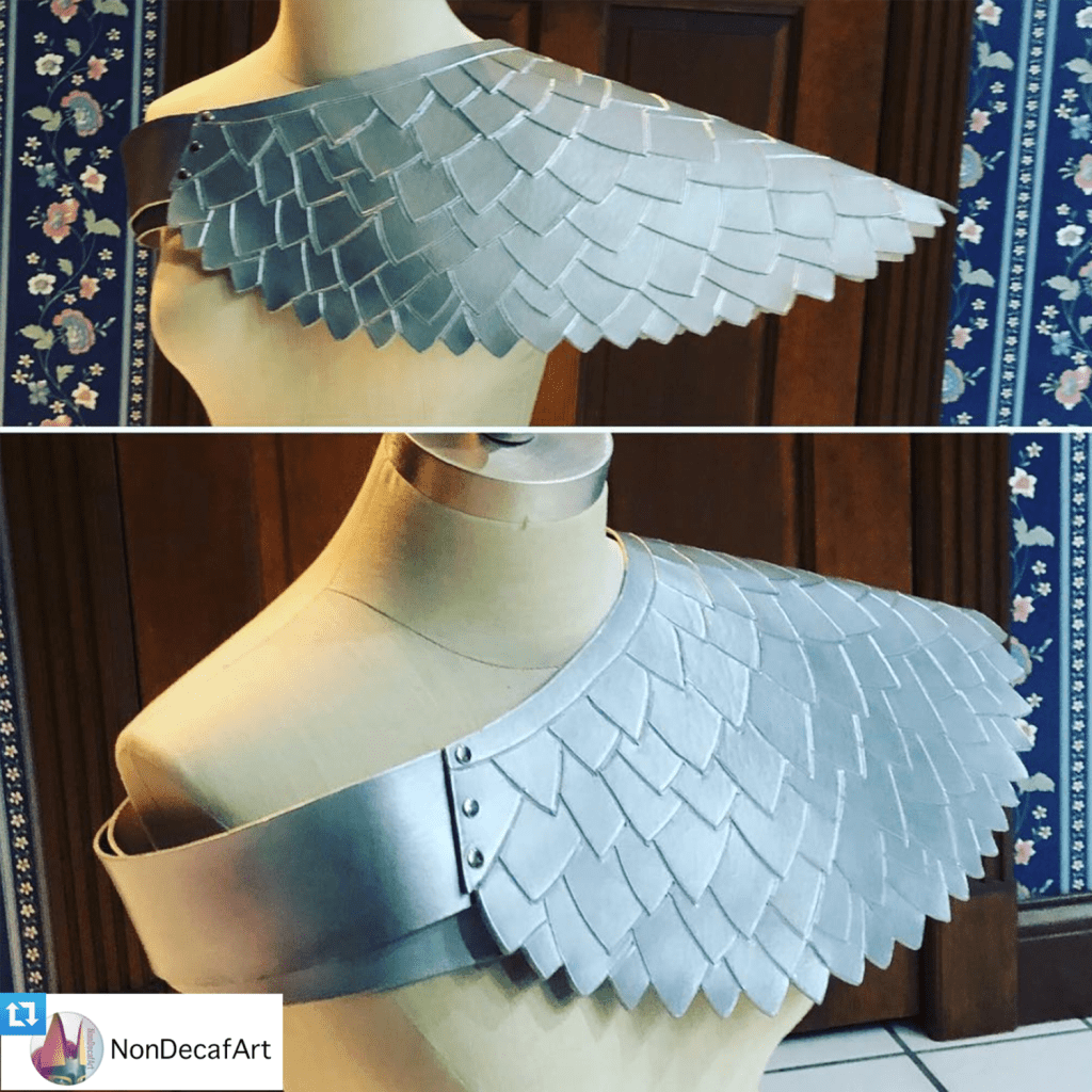 SIlver Egyptian-style leather shoulder piece